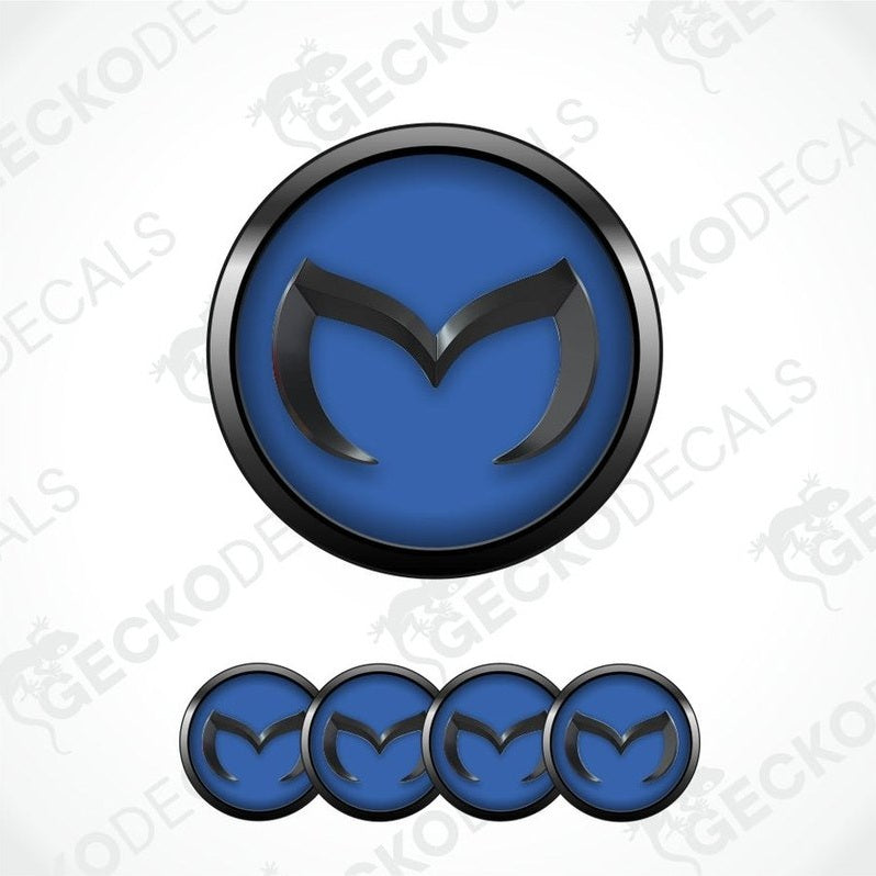 Blue and black logo with a stylized 'M' on a white background with 'GECKODECALS' watermark.