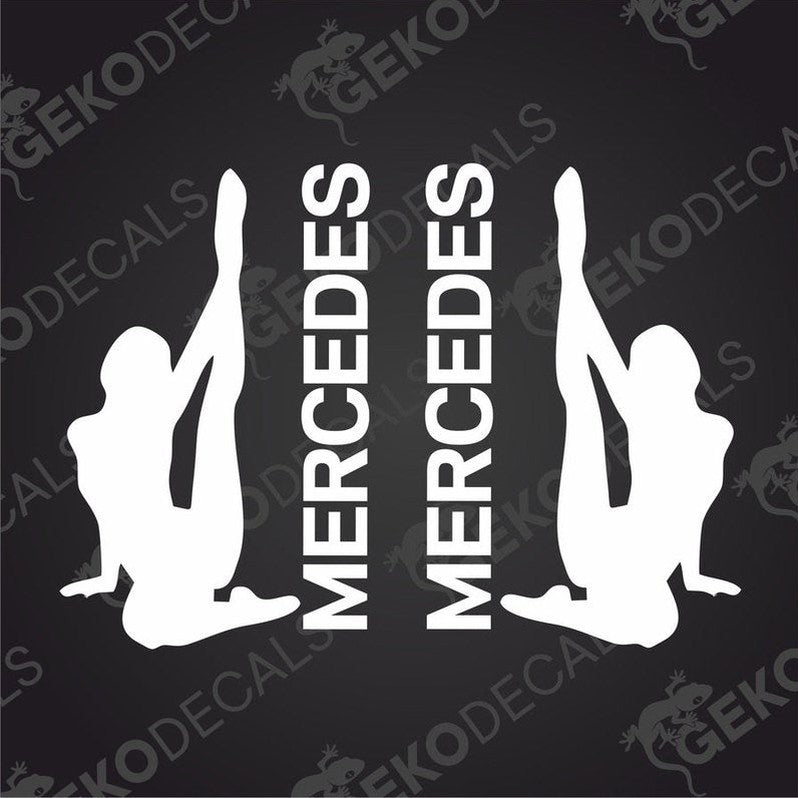 A set of two black decals with the text 'MERCEDES' and an illustration of a girl sitting in a Mercedes-Benz vehicle.