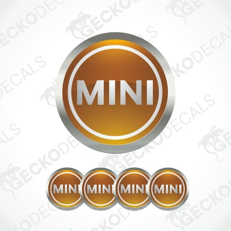Gold and silver 'MINI' logo decal on a white background