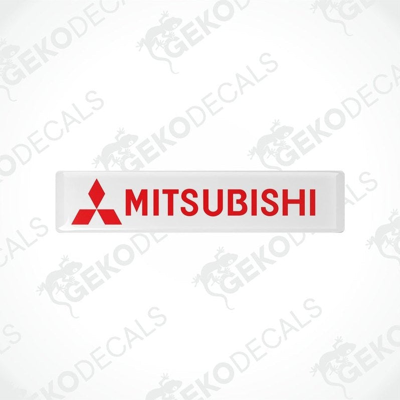 Rectangular white vinyl decals with the red Mitsubishi logo and text 'MITSUBISHI' printed in capital letters.