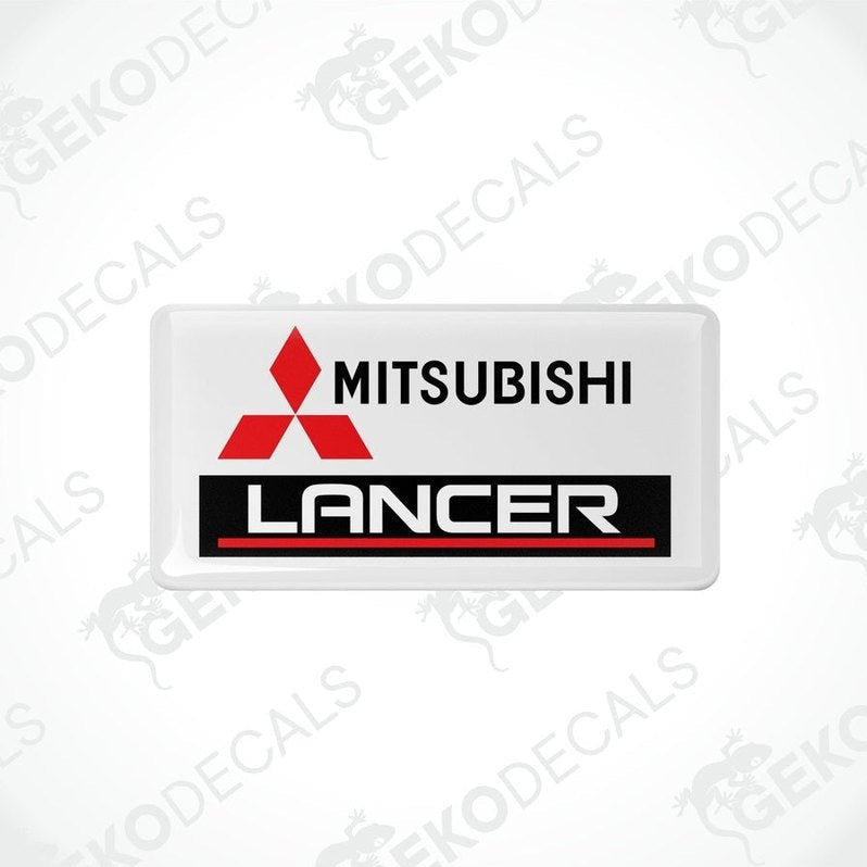 White vinyl stickers with red and black Mitsubishi Lancer branding.