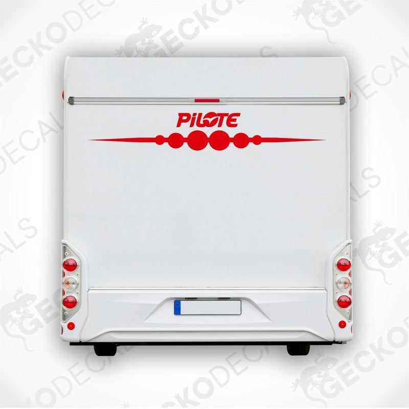Rear view of a white caravan with the Pilote brand decal on the side.