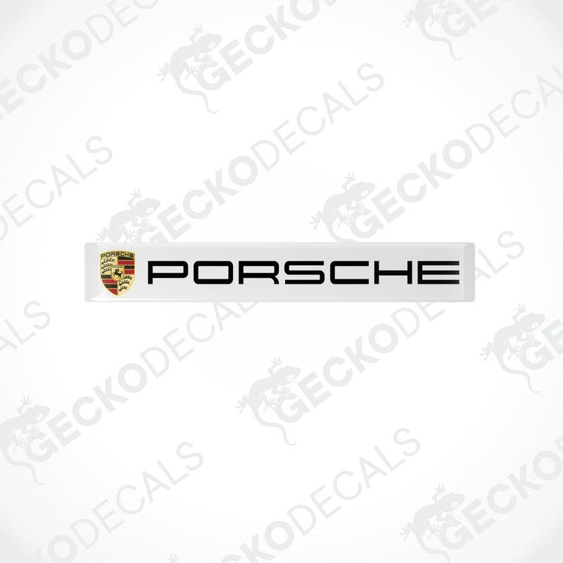 Withe vinyl stickers with the Porsche brand logo on each.