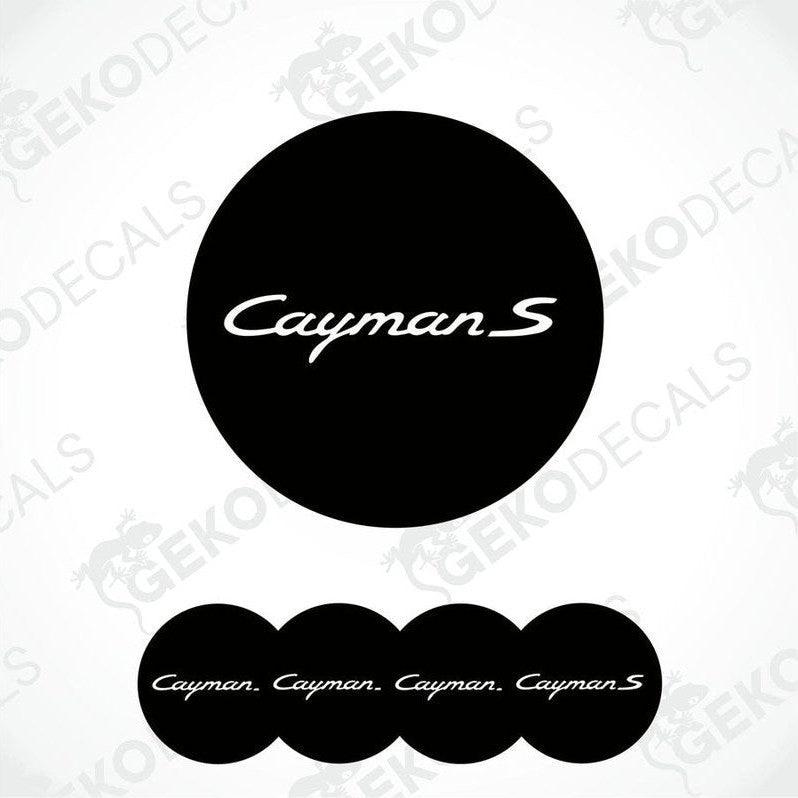 A set of four black vinyl stickers with the word 'CAYMAN S' printed on them, arranged in a stack with the top sticker being the one that shows the word 'CAYMAN S' the most clearly.
