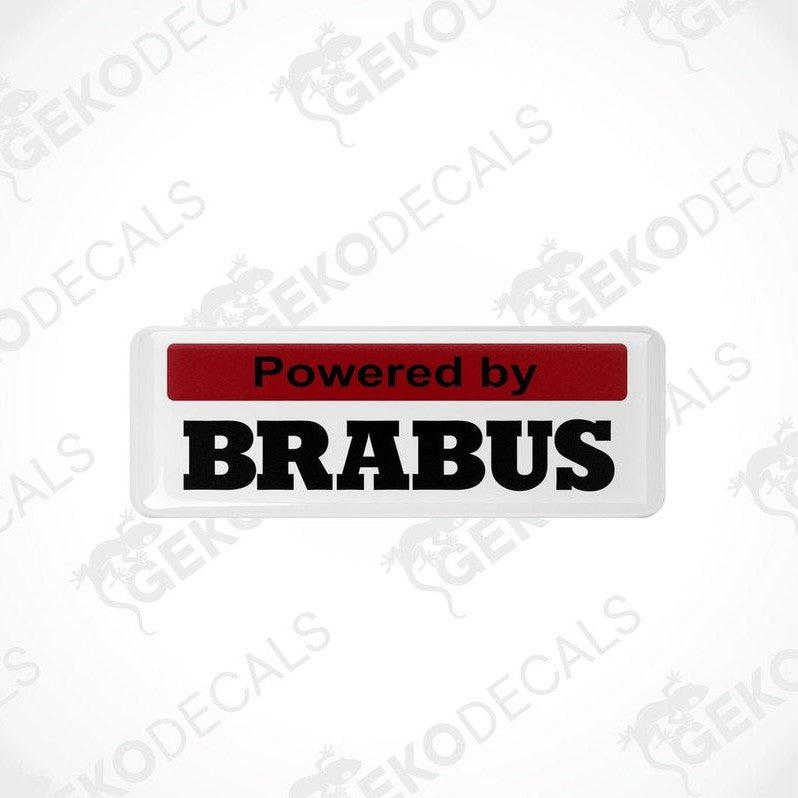 White and red vinyl decals with black text that read 'POWERED BY BRABUS.