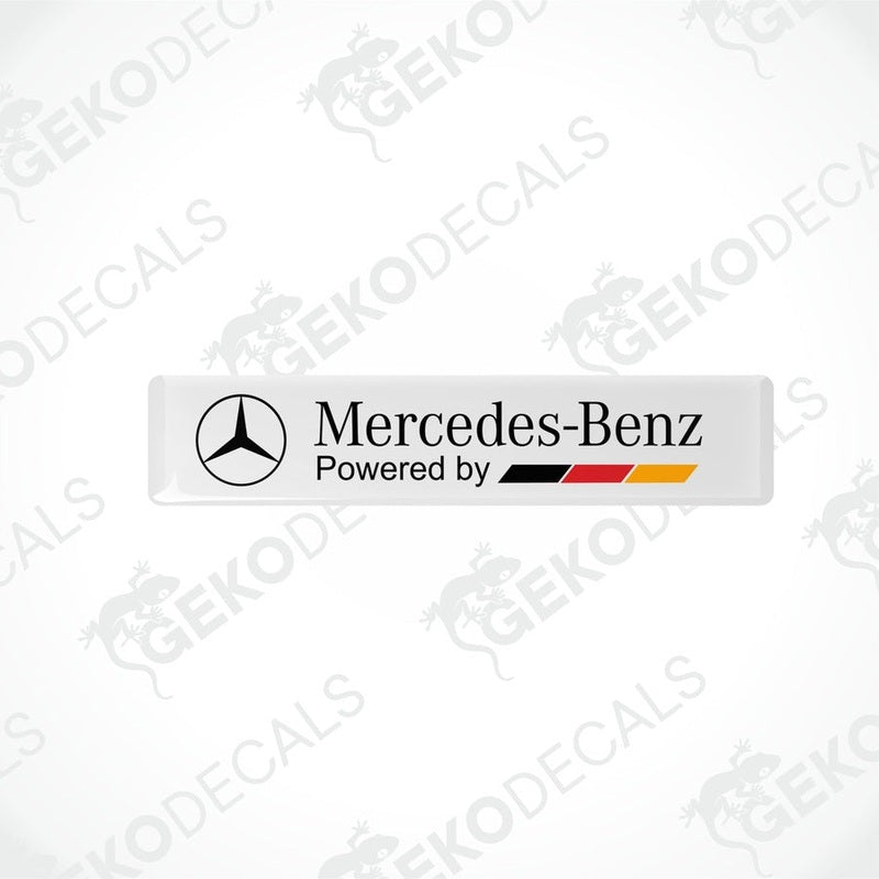 Withe vinyl decals with the 'Mercedes-Benz Powered by' text in black and red-yellow accents.