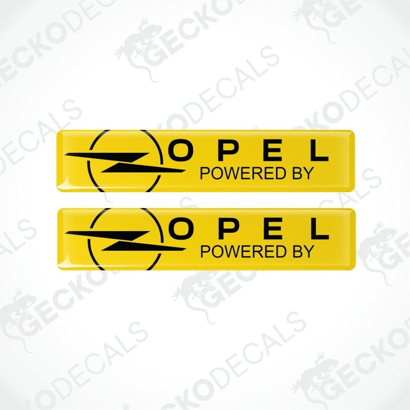 Two yellow Opel decals with black text on a white background.