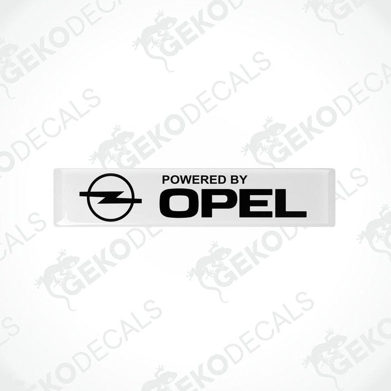 Withe vinyl stickers with the text 'POWERED BY OPEL' and the Opel logo.