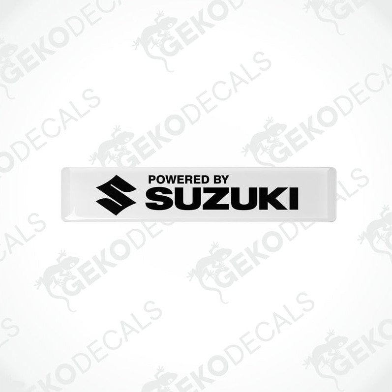 Withe vinyl stickers with the text 'POWERED BY SUZUKI' and the Suzuki logo.