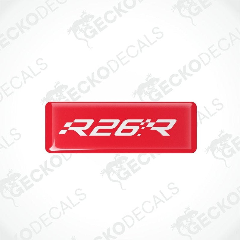 Red rectangular vinyl decals with 'R26.R' withe text on them, intended for use as car stickers.