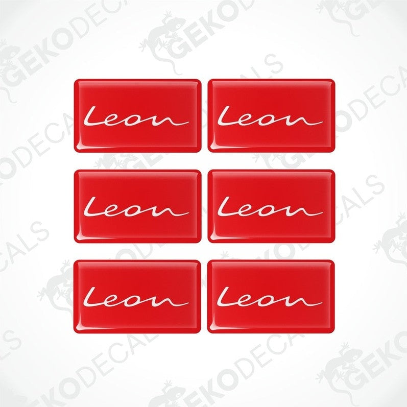 A set of six red vinyl decals with the text 'Leon' on them, arranged in two rows with three decals in each row.
