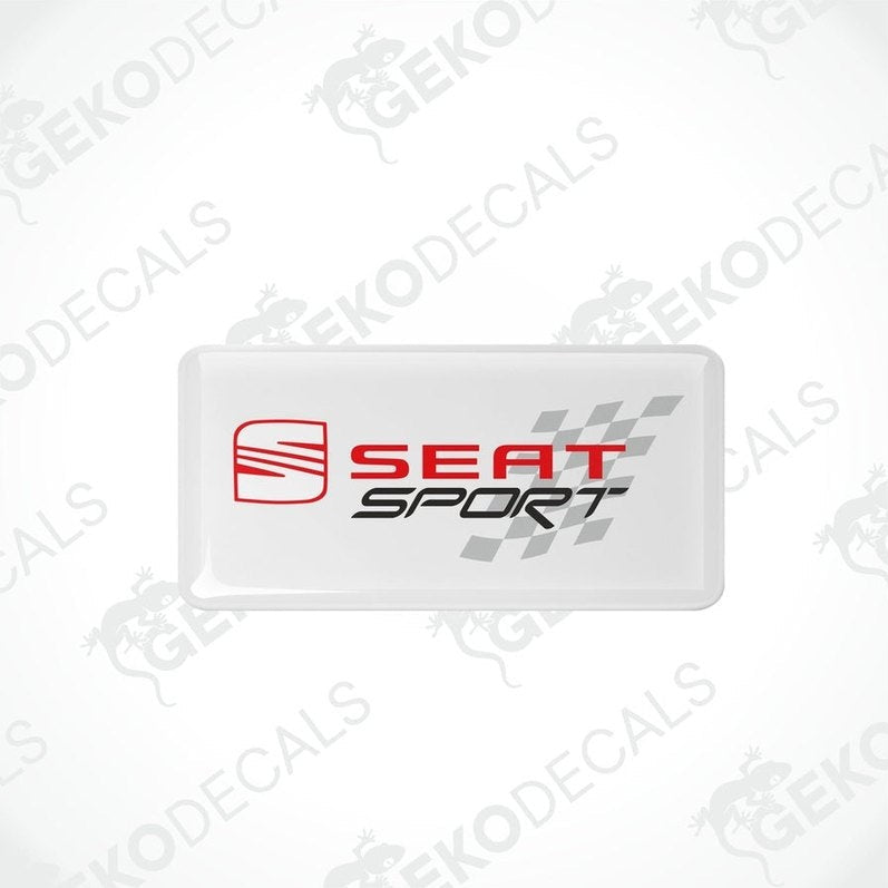 Rectangular withe vinyl decals with the 'SEAT SPORT' logo in black and red, and a checkered design.