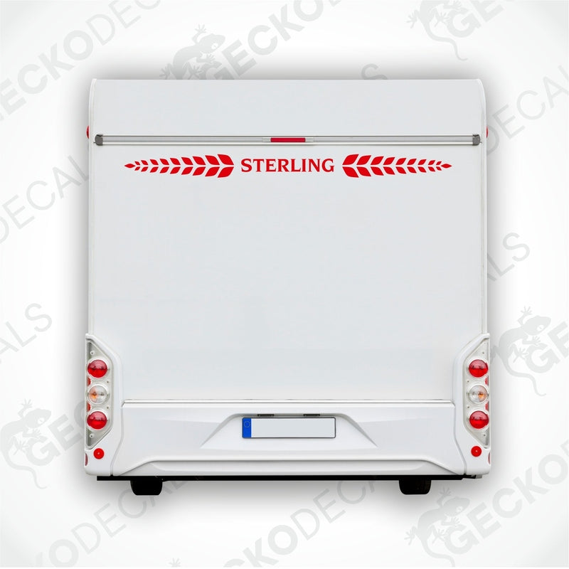 A white Sterling caravan with a red and white decal on the rear side, featuring the brand name 'STERLING'.