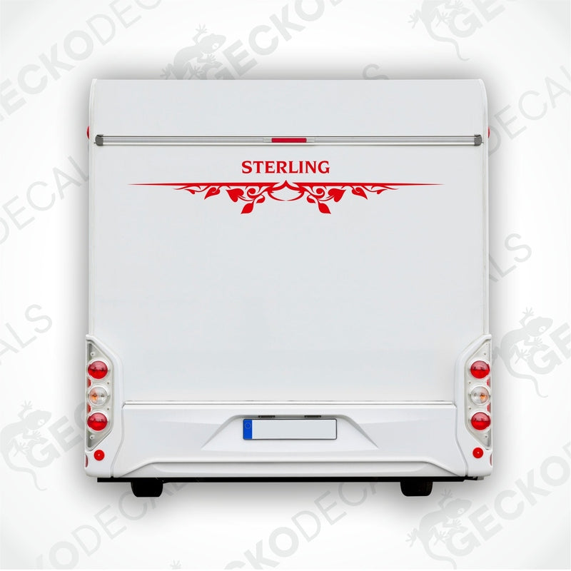 Rear decal of a white caravan with the brand name 'STERLING' in red and black.