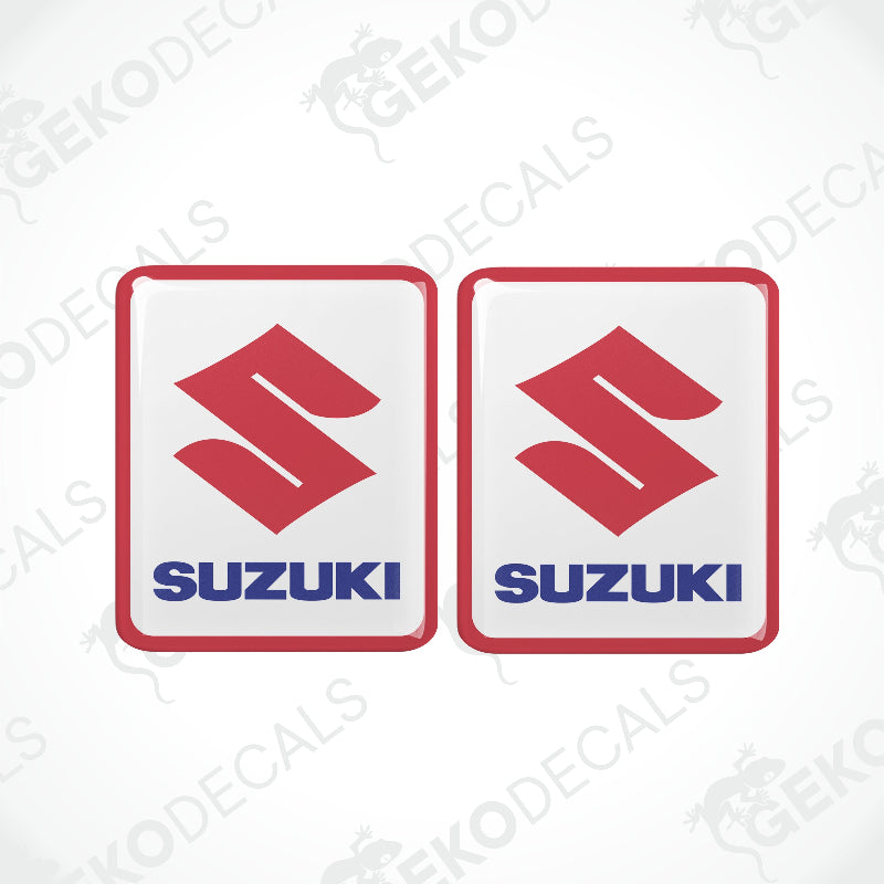 Two red, white, and blue vinyl decals with the SUZUKI logo.