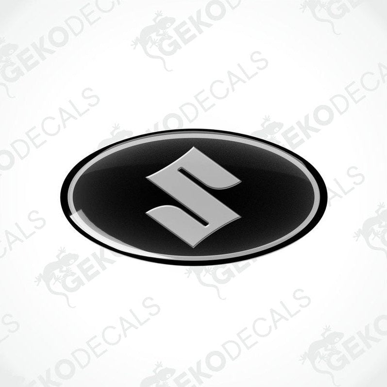 Round black vinyl stickers with a silver 'S' logo for SUZUKI, with a visible GeckoDecals logo in the corner.