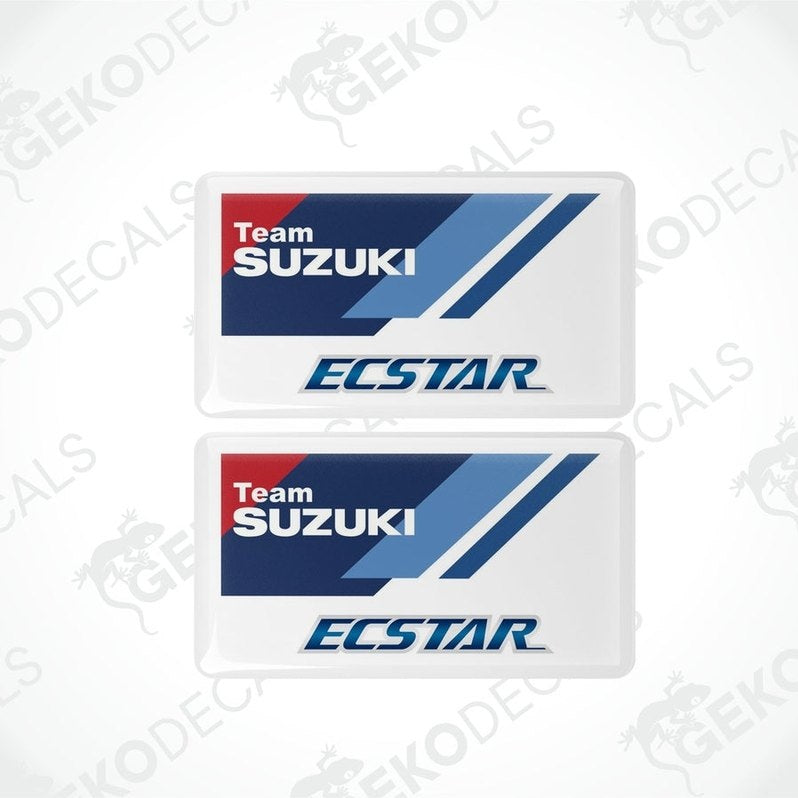 Two rectangular vinyl decals with a polyurethane coating featuring the Team SUZUKI ECSTAR logo in blue, red, and white colors.