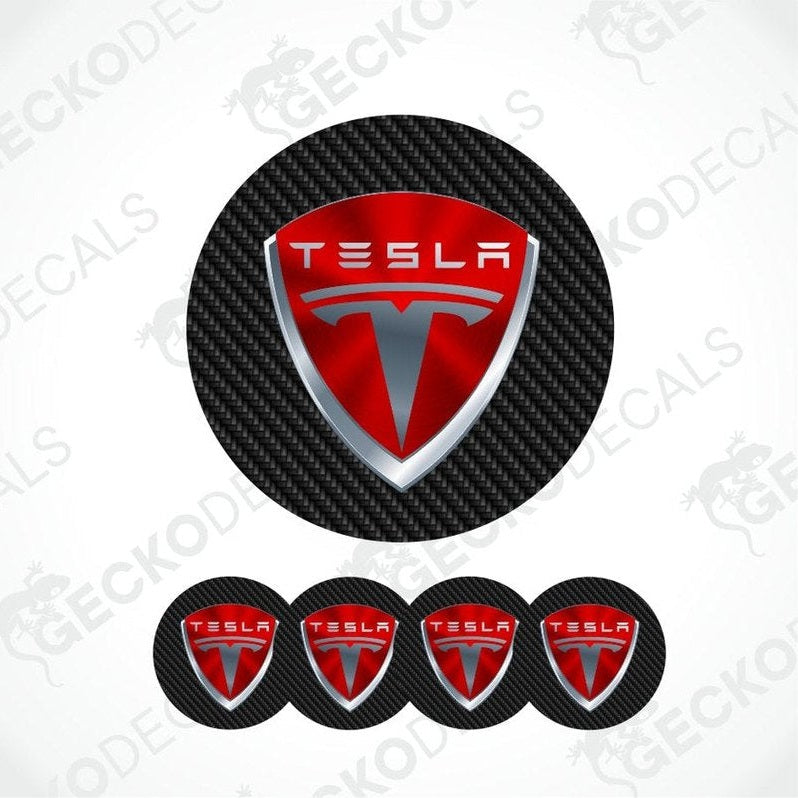 Tesla logo decal set on a carbon fiber pattern background