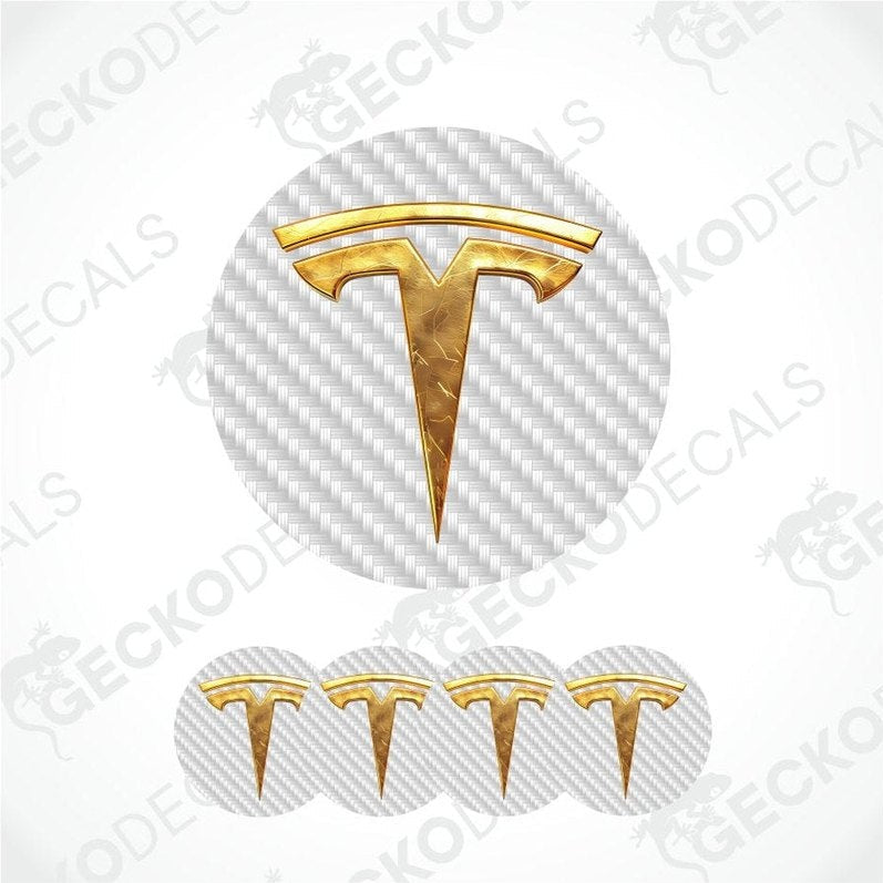 Gold Tesla logo decal on a white carbon fiber pattern background