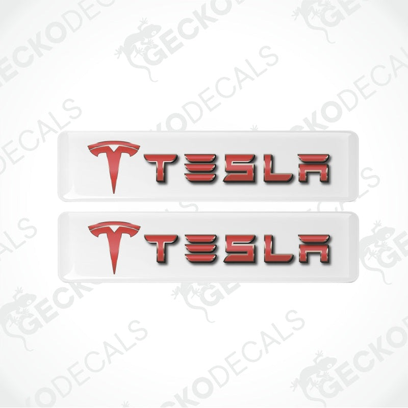 Two Tesla logo decals on a white background with 'Gecko Decals' branding.