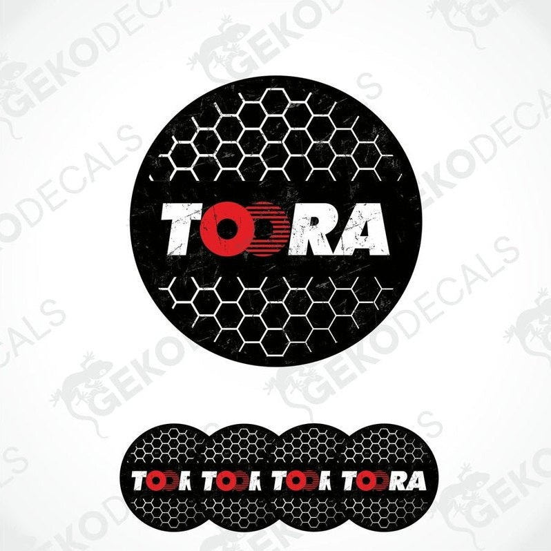 A set of four round car decals with the brand name 'TOORA' prominently featured in a honeycomb pattern design.