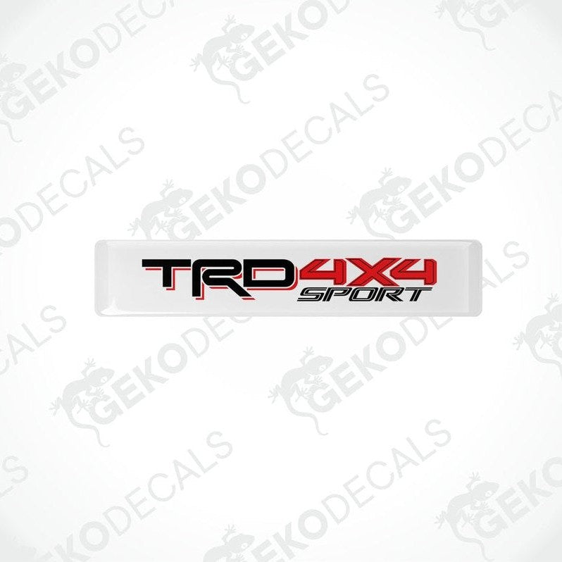 Withe decals with red and black text that reads 'TRD 4X4 OFF ROAD'.