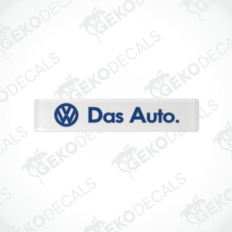 Withe rectangular vinyl decals with 'Das Auto.' text and the Volkswagen logo in blue.