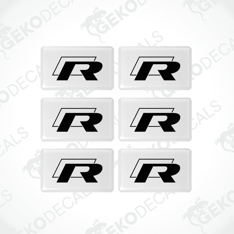 A set of six withe vinyl stickers with the letter 'R' and the VOLKSWAGEN brand logo.