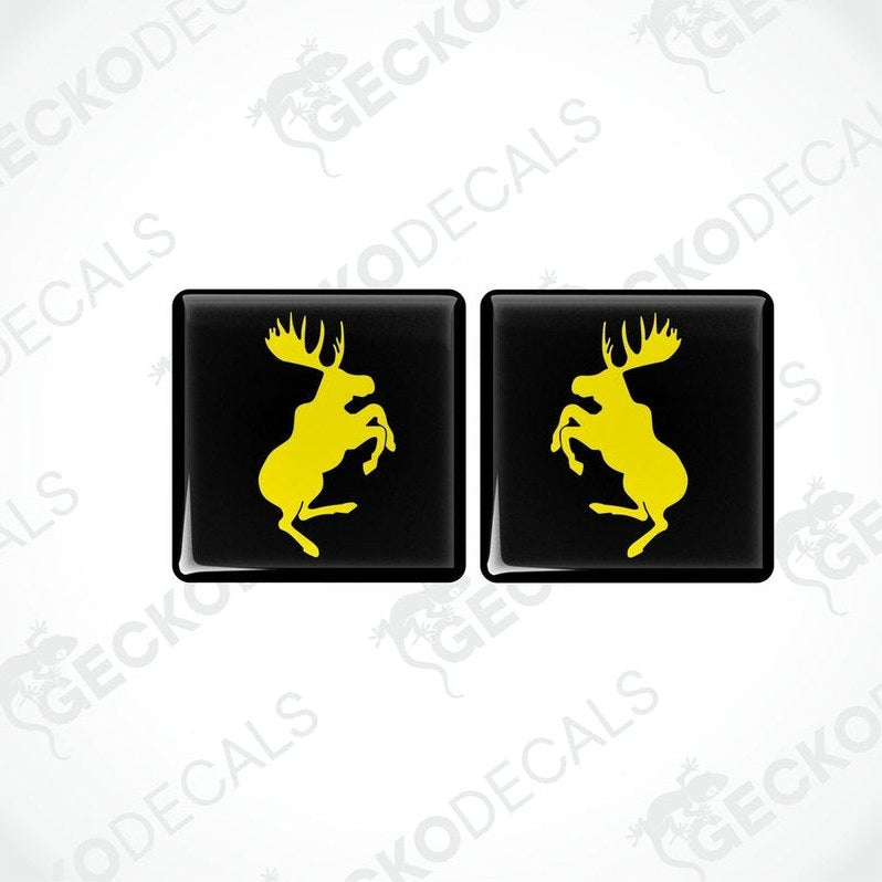 Two black vinyl decals with yellow silhouette of a moose, designed for use as car stickers.
