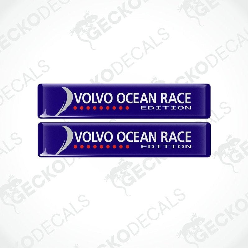 Two blue vinyl stickers with the text 'VOLVO OCEAN RACE EDITION' and a logo consisting of a white arrow, red and white circles, and the Volvo brand logo.