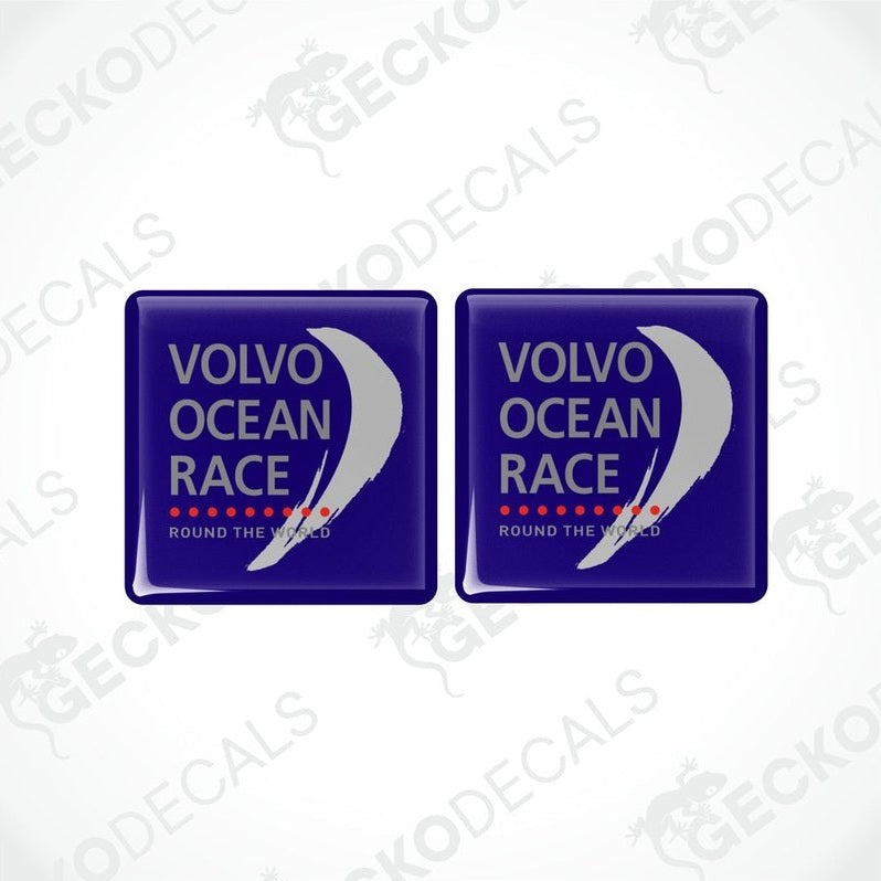 Two blue vinyl stickers with the text 'VOLVO OCEAN RACE ROUND THE WORLD' and a graphic design that resembles a sailboat.