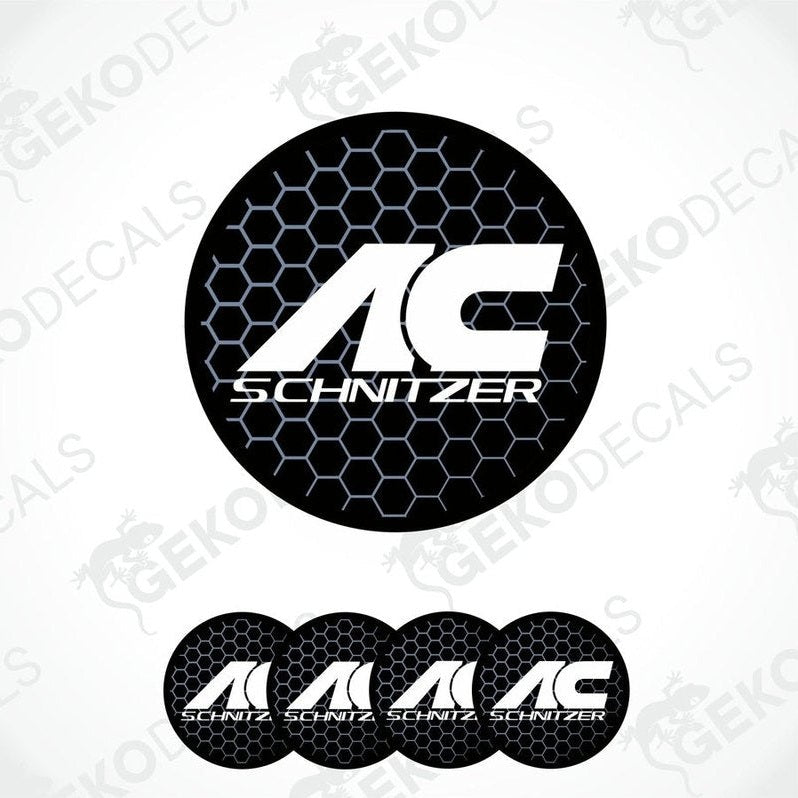A set of four black vinyl stickers with 'AC SCHNIZER' text and a honeycomb pattern design.