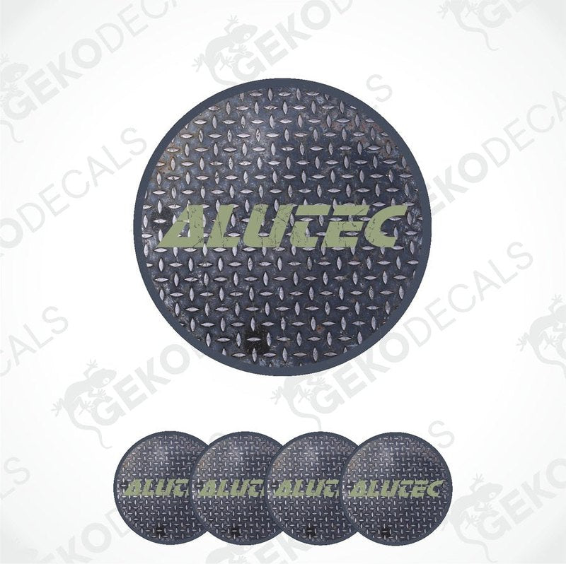 A set of four black round vinyl stickers with the text 'ALUTEC' and a geometric pattern in the background.