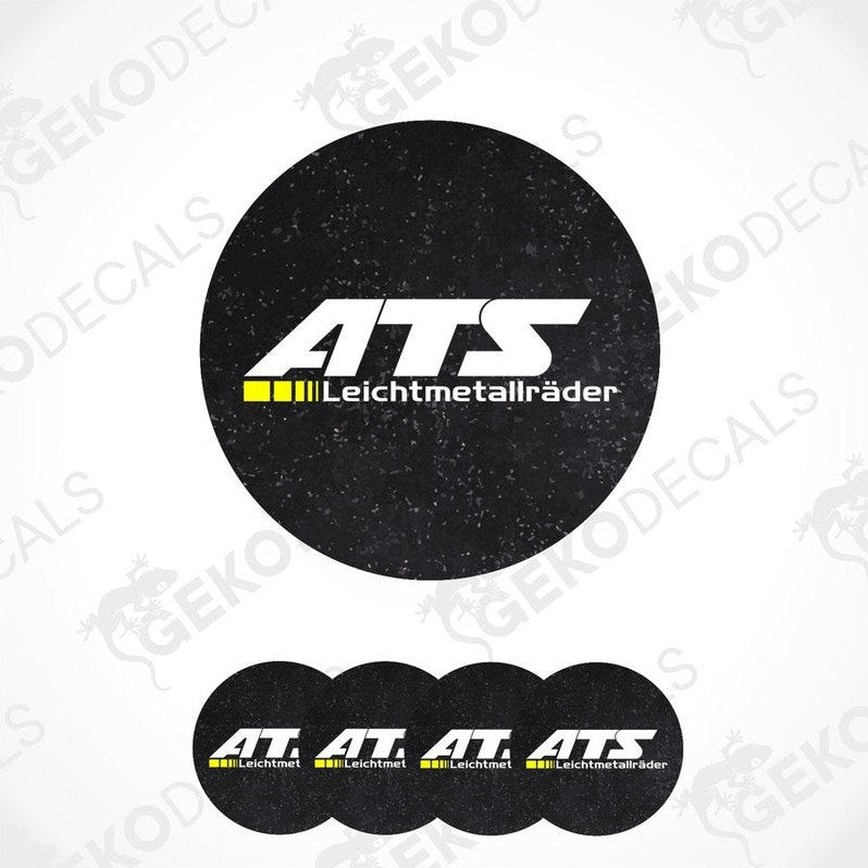 A set of four black round car decals with the ATS Leichtmetallräder logo in white and yellow.