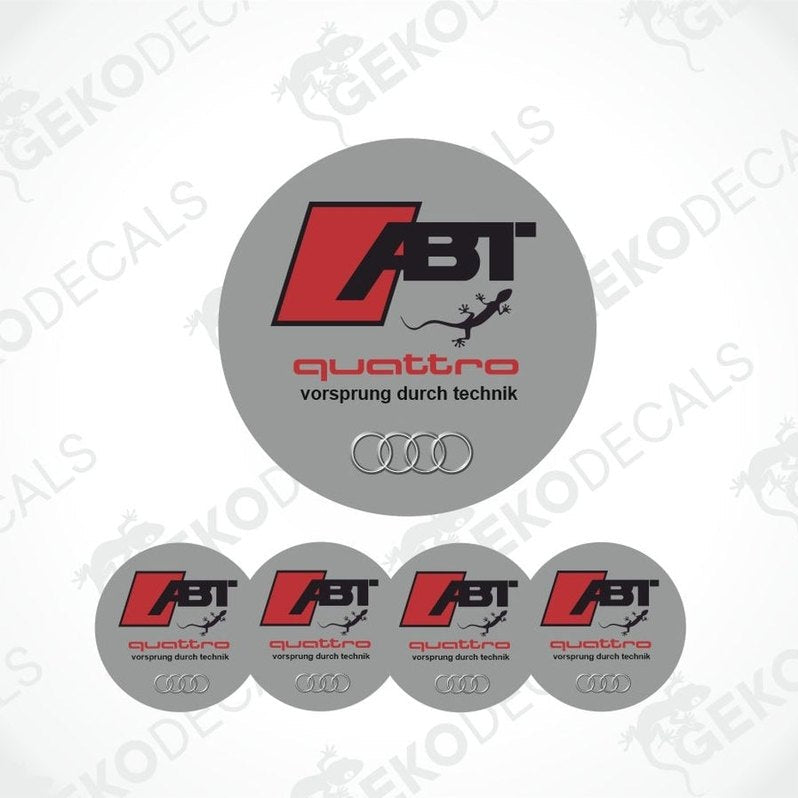 Set of four Audi ABT Quattro wheel decals with a silver, red, and black color scheme and the text 'quattro' and 'vorsprung durch technik'.
