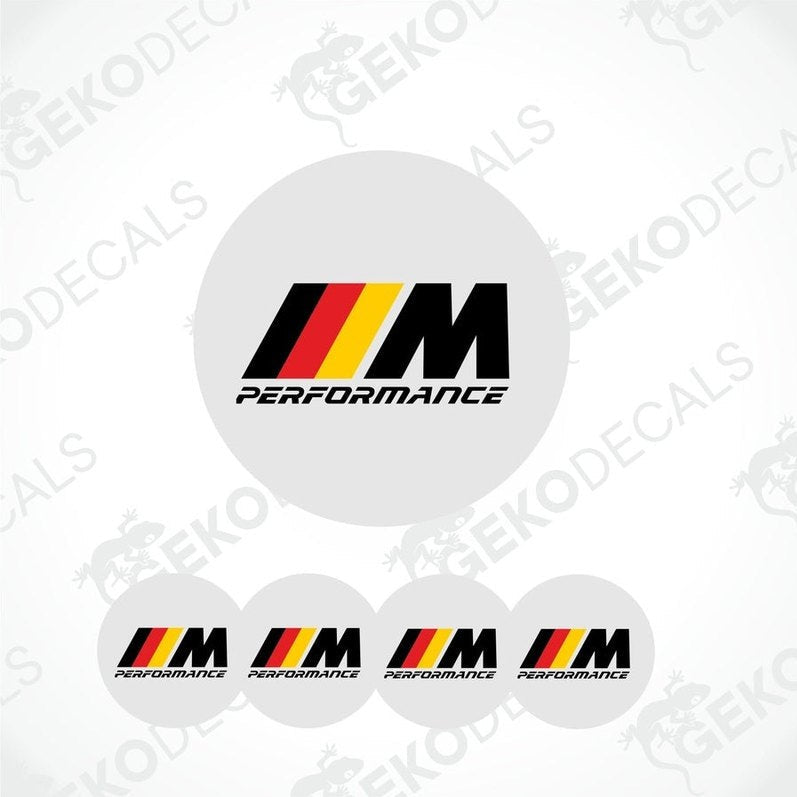 A set of four white vinyl stickers with the BMW M Performance logo in black, red, and yellow.