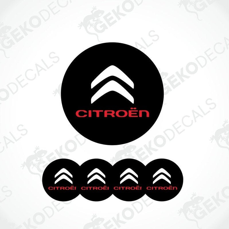 A set of black and white vinyl decals with the CITROEN logo, intended for use as car wheel caps and stickers.