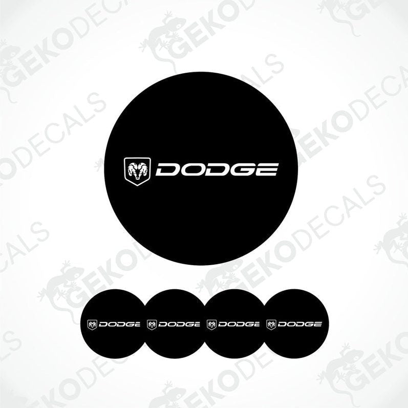 A set of black vinyl decals with the Dodge logo, including four round stickers and one larger oval sticker.