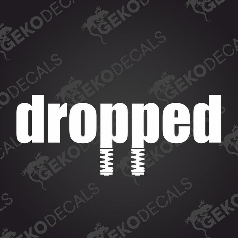 A white decal with the word 'dropped' written in a bold, graphic font, accompanied by a visual representation of a dropped weight, also in white, against a black background.