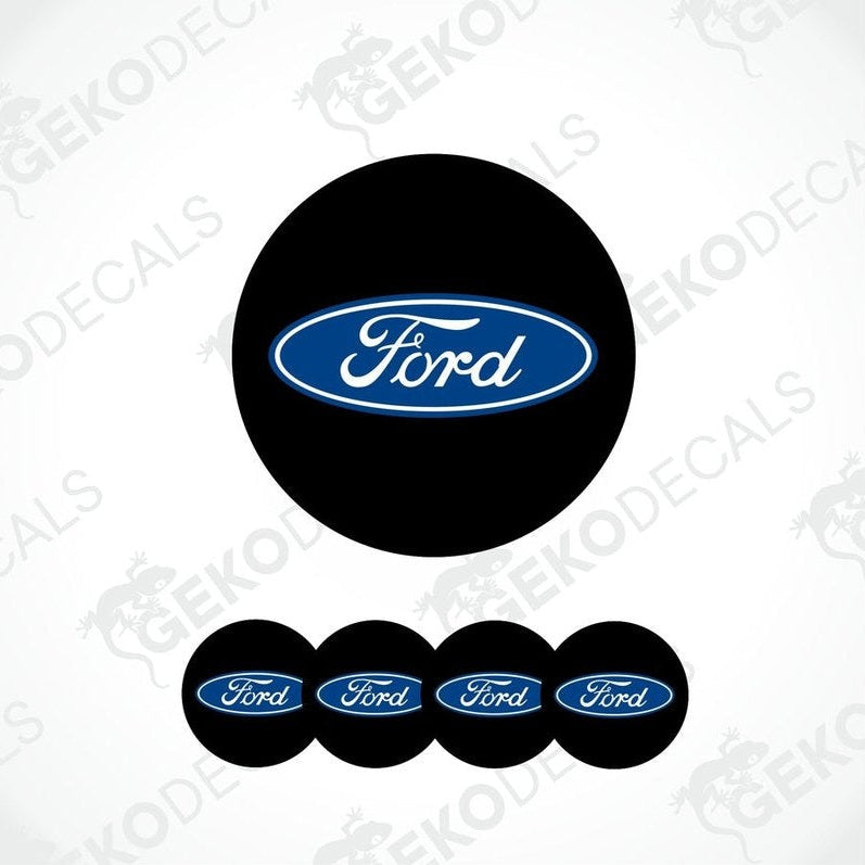 A set of four vinyl decals with the Ford logo, three are for wheels and one is for the car body.