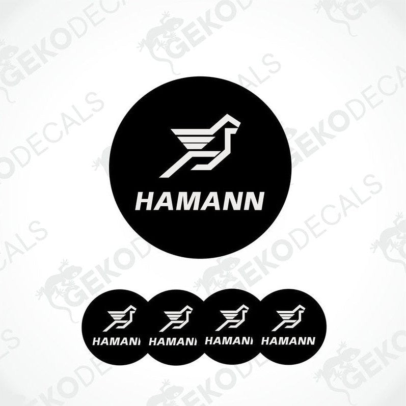 A set of four black vinyl stickers with the HAMANN brand logo and a bird symbol on them.