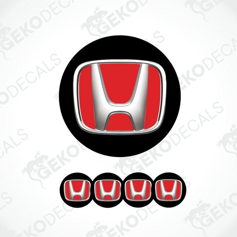A set of black vinyl decals with the HONDA logo, designed for use as car wheel caps and stickers.