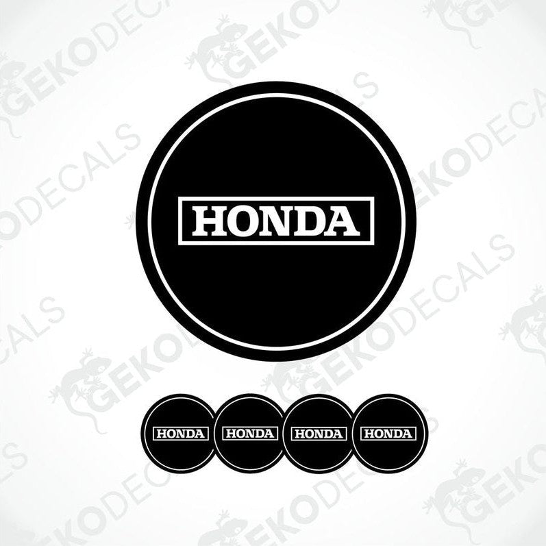 A set of four black and white vinyl stickers with the Honda brand logo.