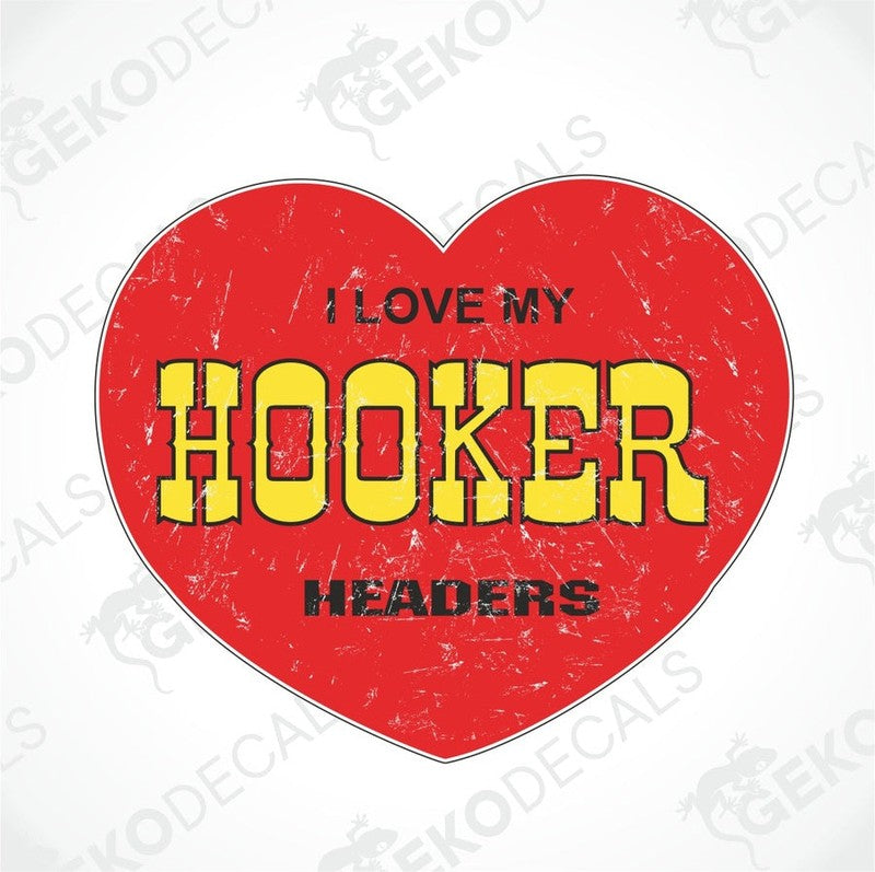 Big red heart in which is written with black and yellow I LOVE HOOKER HEADERS.