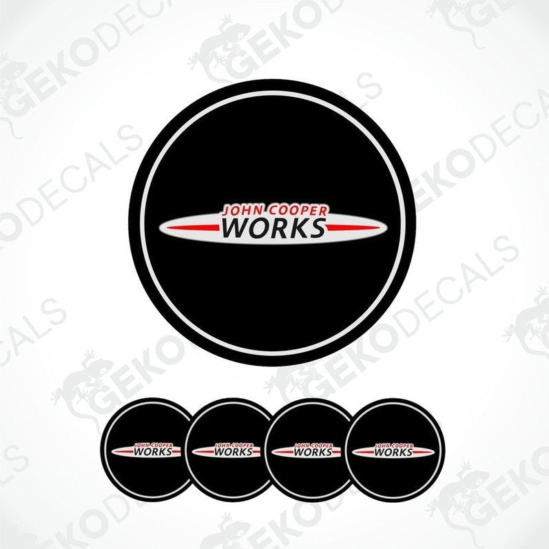 Set of four round car decals with 'John Cooper Works' branding, predominantly black with white and red text.