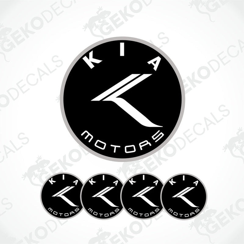 A set of four black and white Kia Motors vinyl decals.