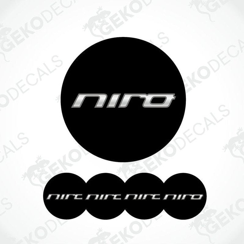 A set of four black vinyl stickers with the word 'KIA NIRO' and a geometric design.