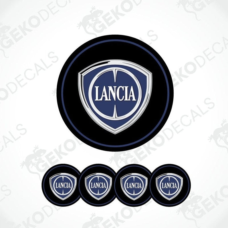 A set of four black vinyl stickers with the LANCIA brand logo in white and blue.