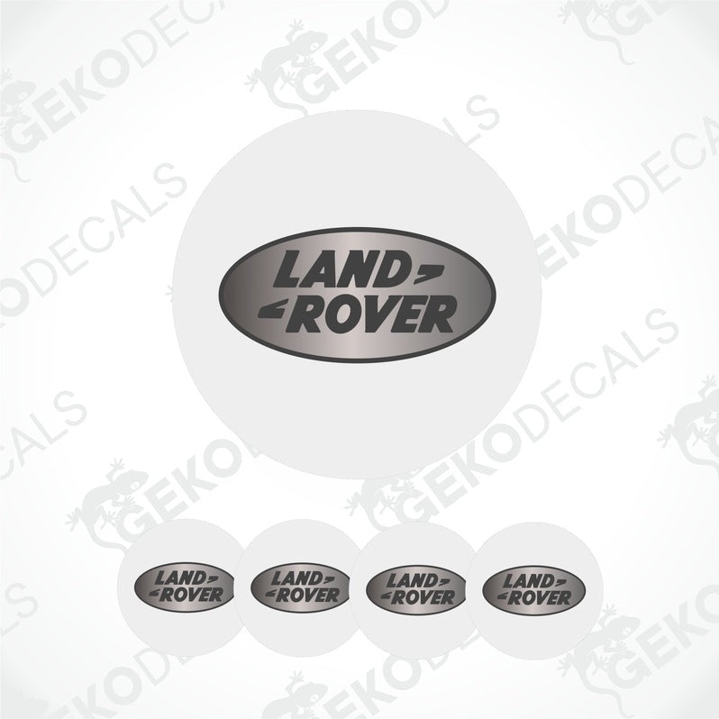 Set of four white round car decals with the LAND ROVER logo in the center.