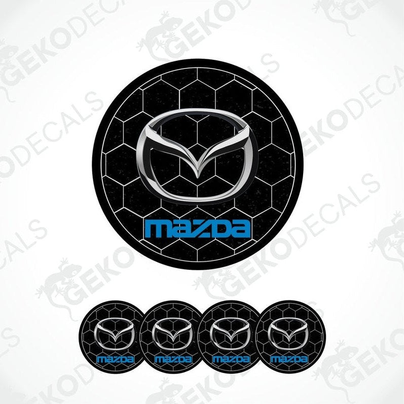 A set of four black and blue Mazda branded vinyl decals, three shown on a car and one on a white background.
